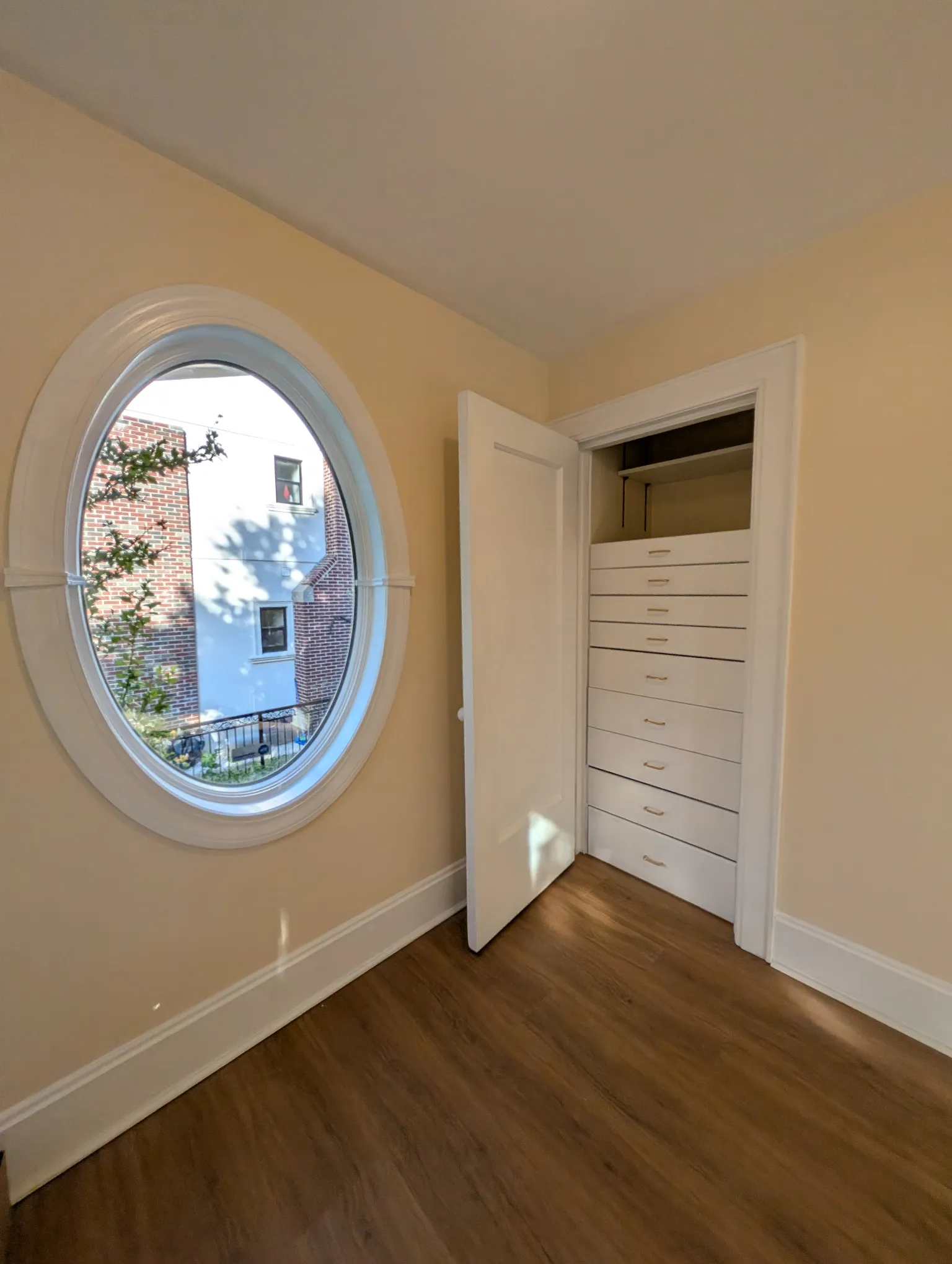 Built-in bank of drawers inside the entry closet