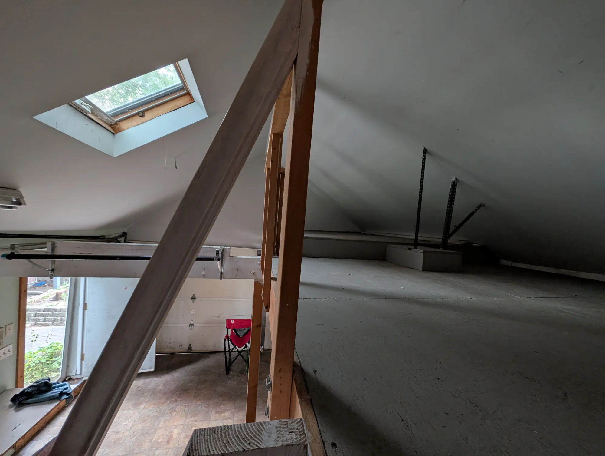 The built-in loft above the garage floor