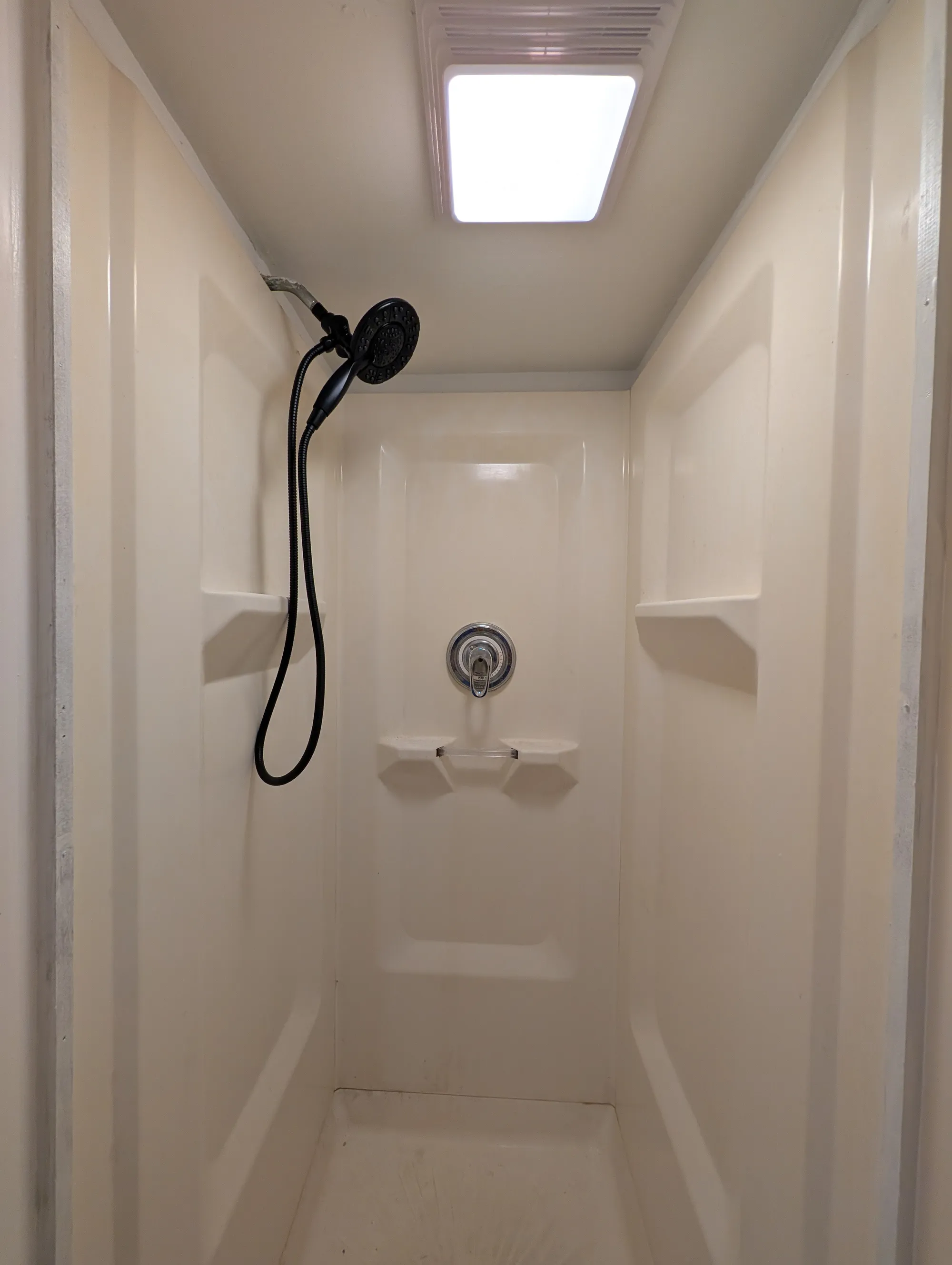 Stand-up shower in the lower-level full bath