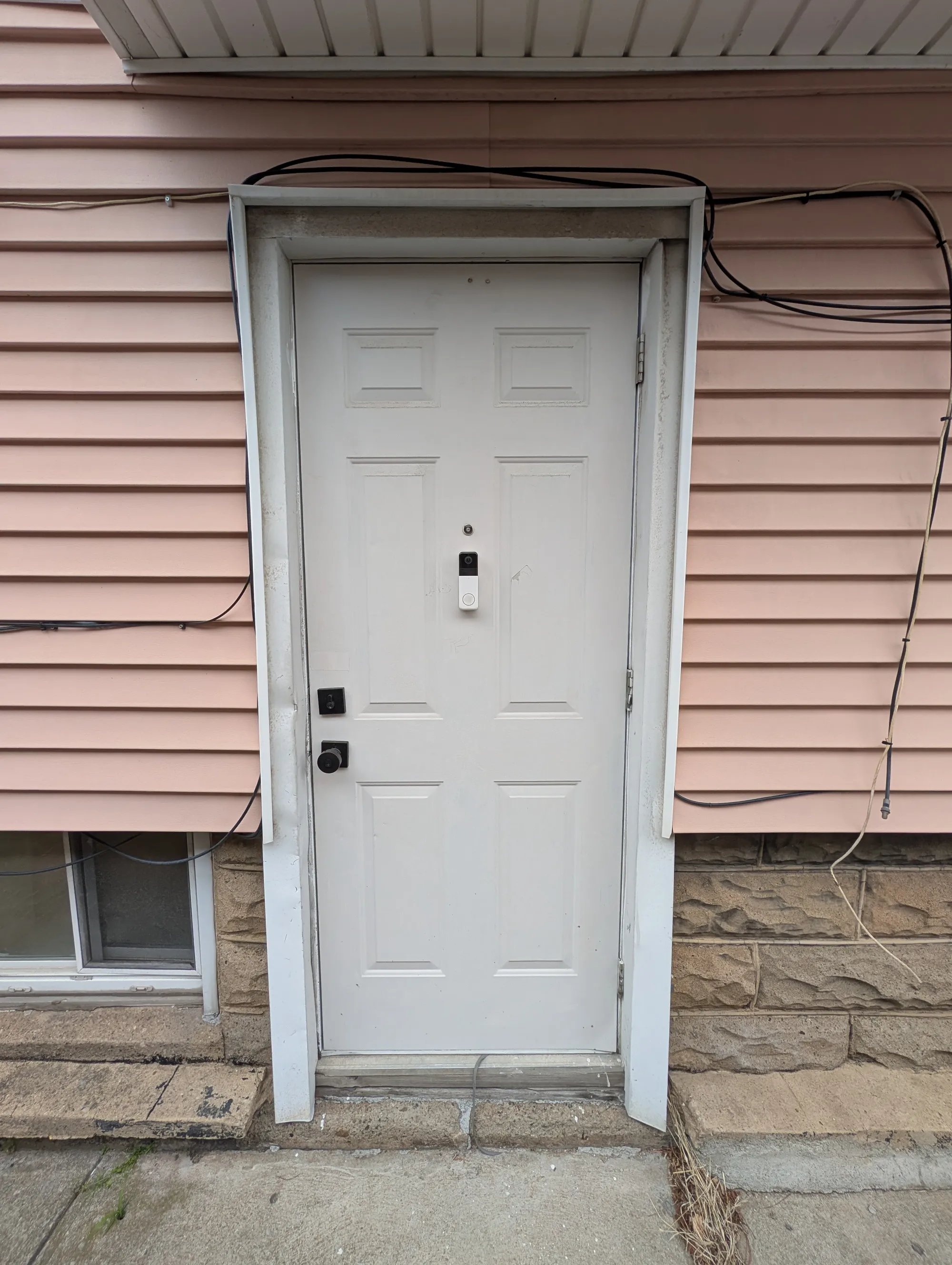 The grade-level side entrance to the lower level